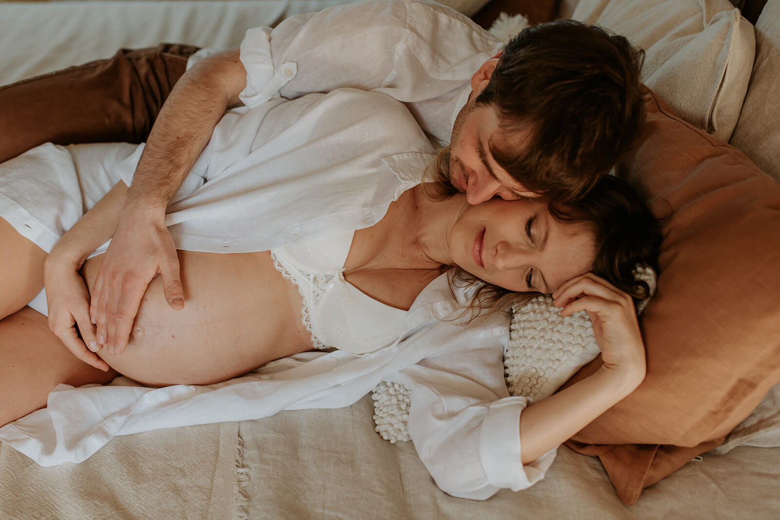 intimate photo of pregnant couple